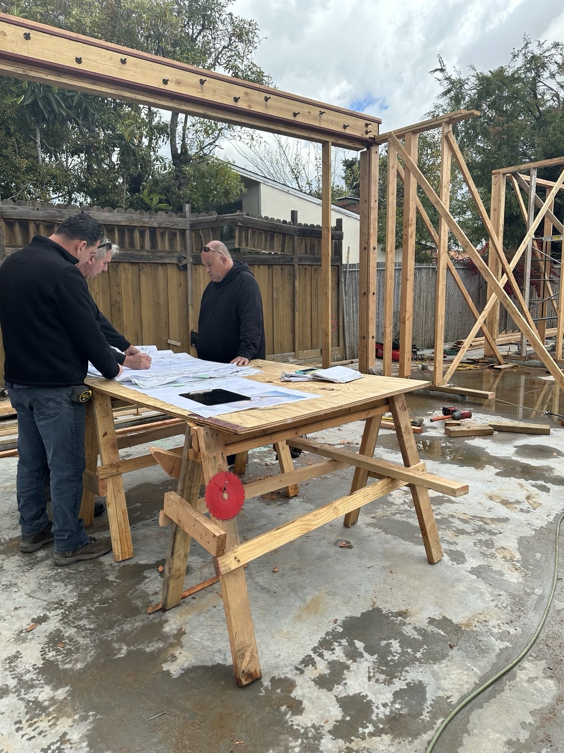 On-site review of architectural plans during the framing stage