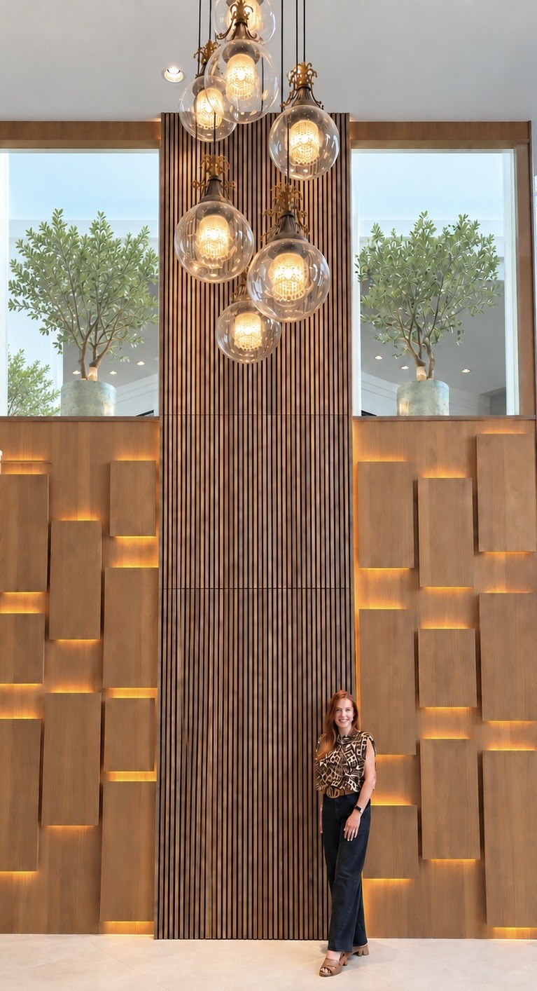 Double-height foyer feature wall and pendant installation