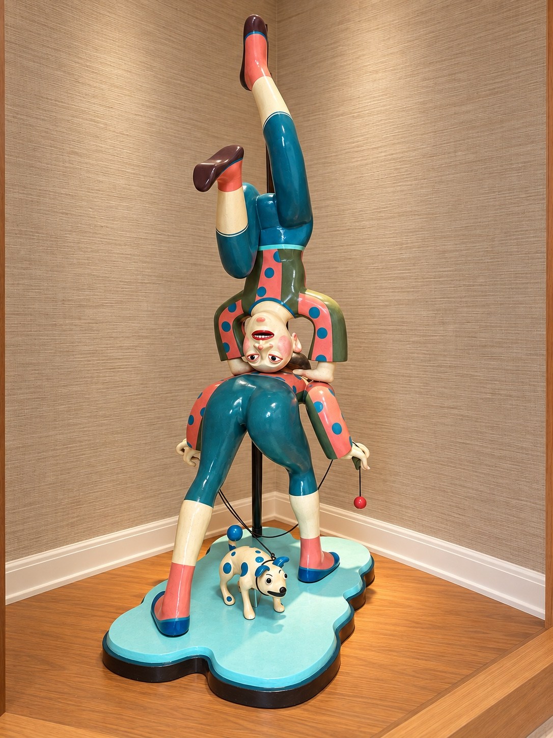 Colorful sculpture displayed in a wall niche